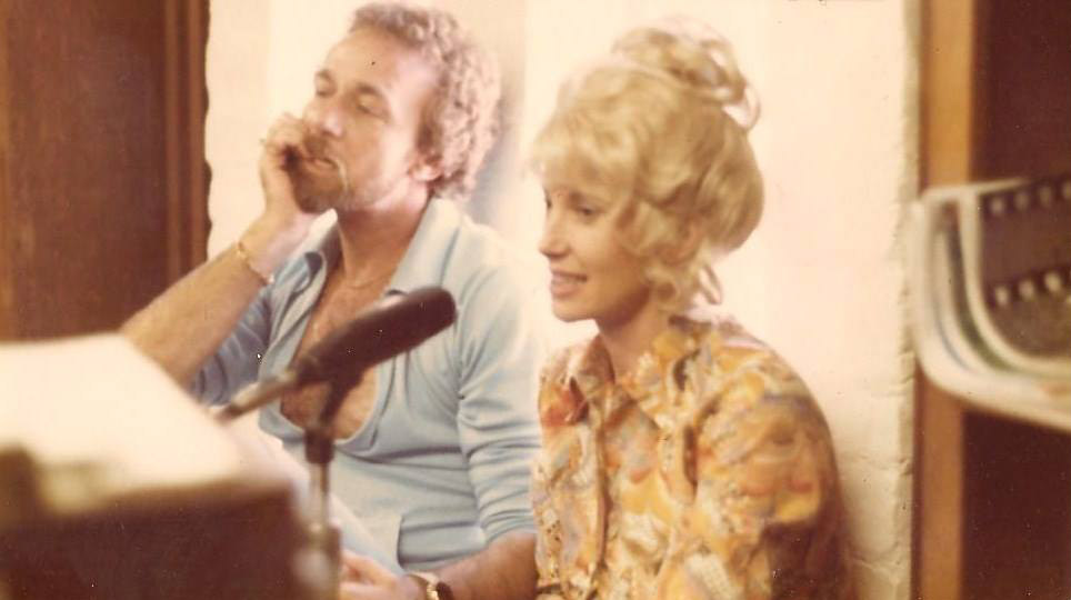 Tammy Wynette with George Richey at a piano