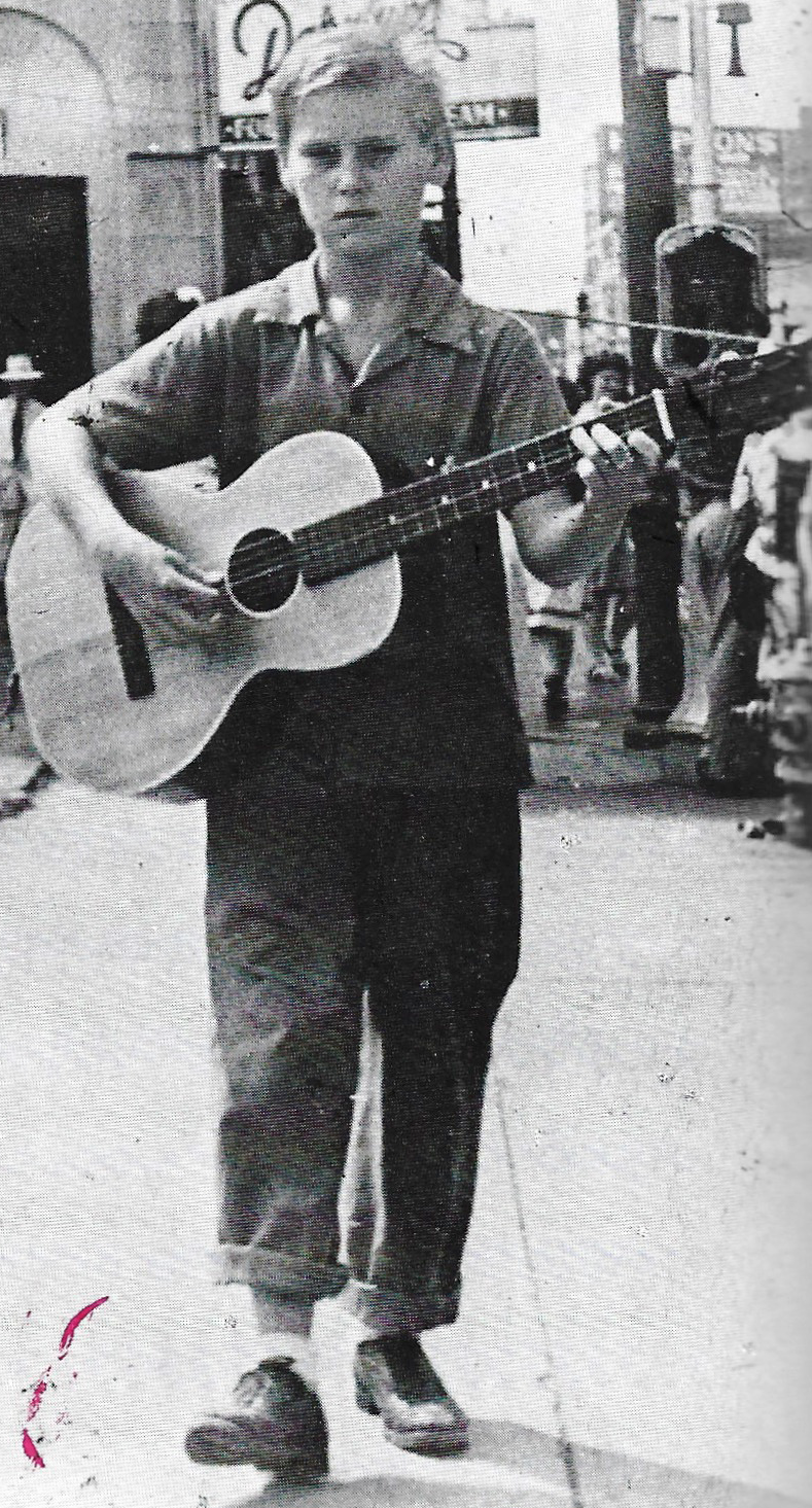 young George Jones playing guitar on the streets of Beaumont